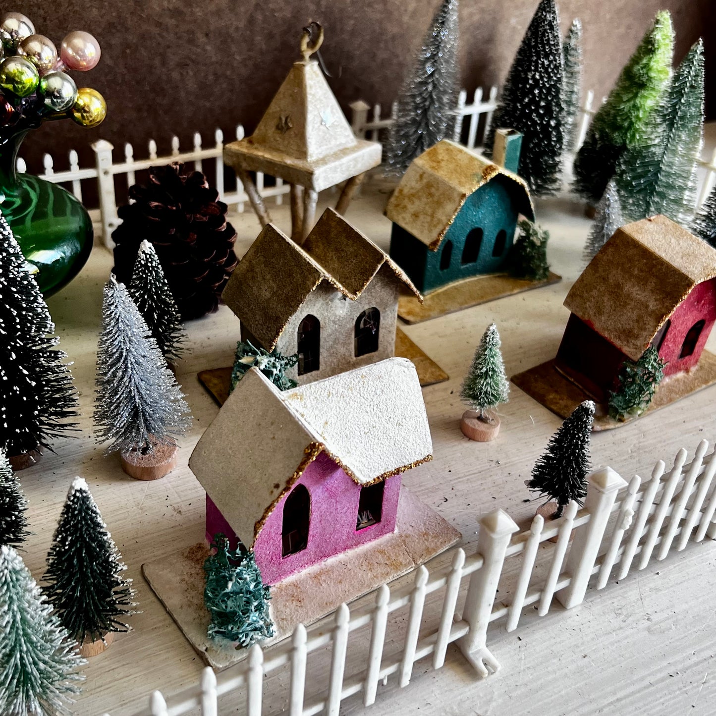 Old Putz Houses with Fence and Bottle Brush Trees