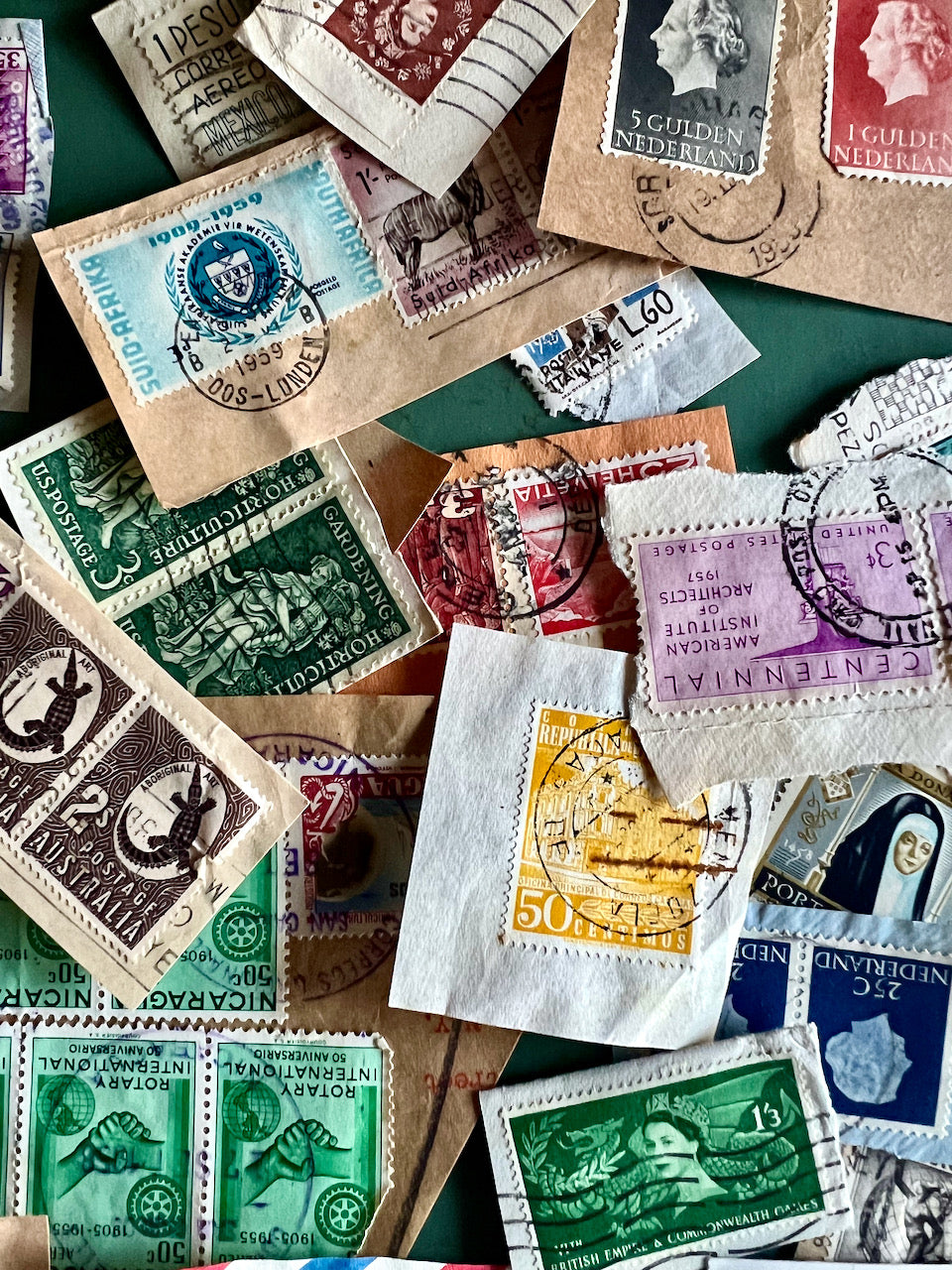 Hundreds of Old Stamps in Vintage Cigar Box