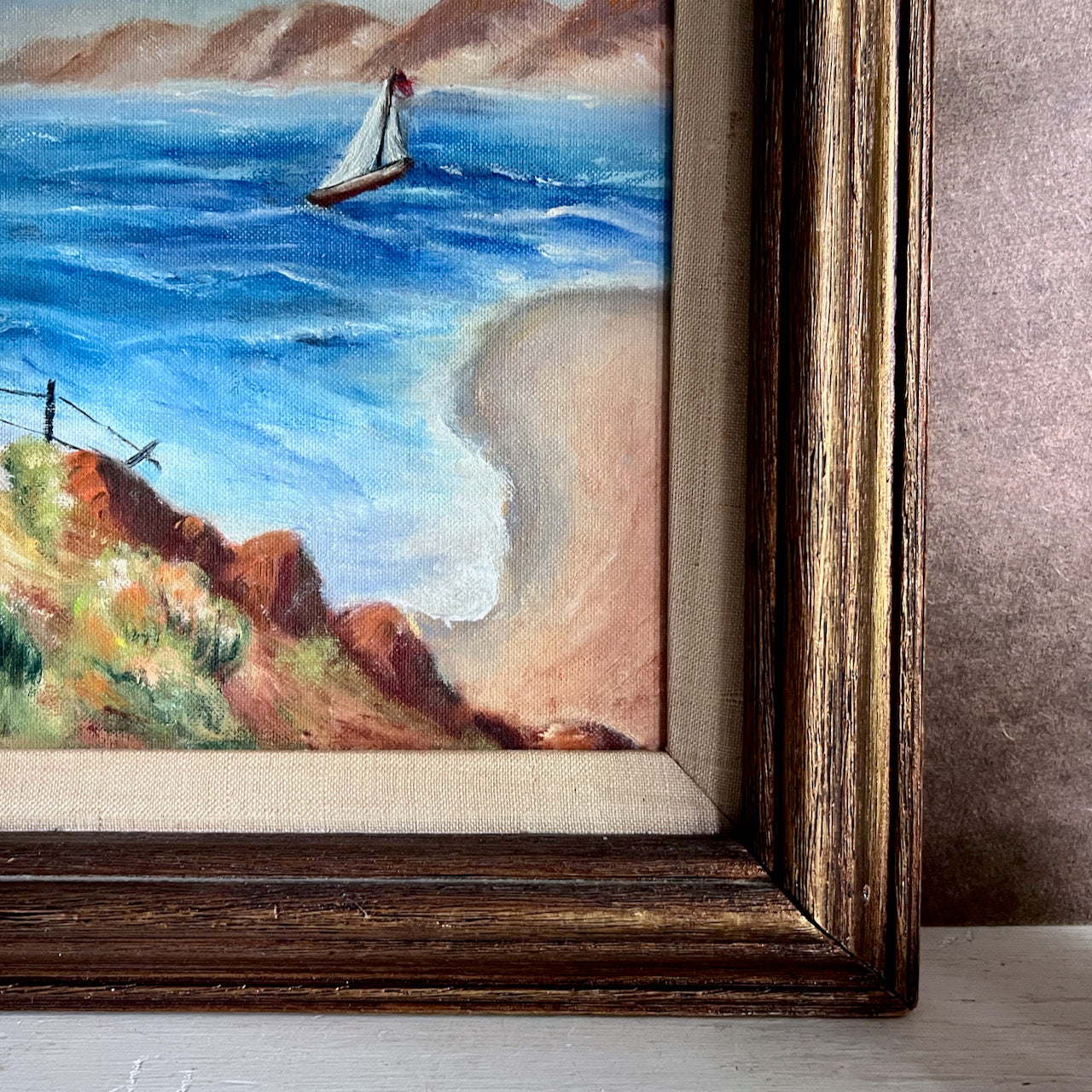 Framed Painting of Colorful Seaside Shanty and Sailboat