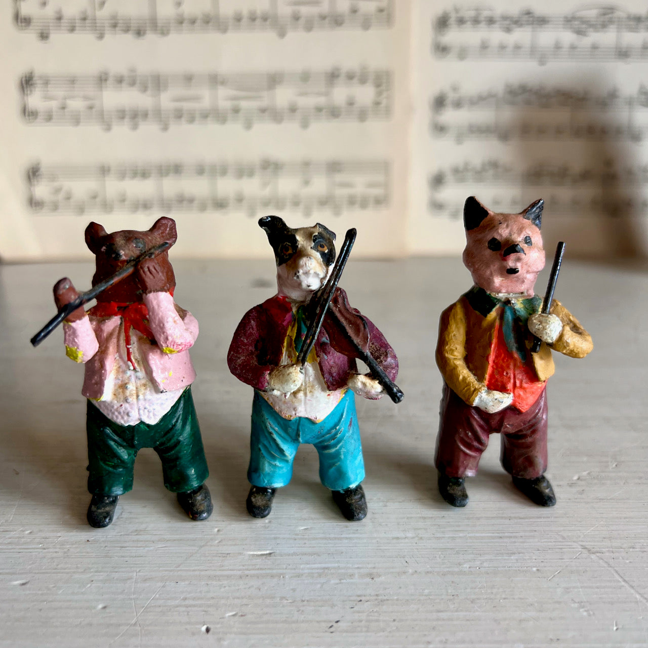 Early Hand Painted Cast Metal Animal Band