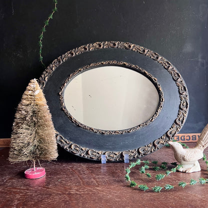 Early Antique Handmade Mirror with Oval Black Frame