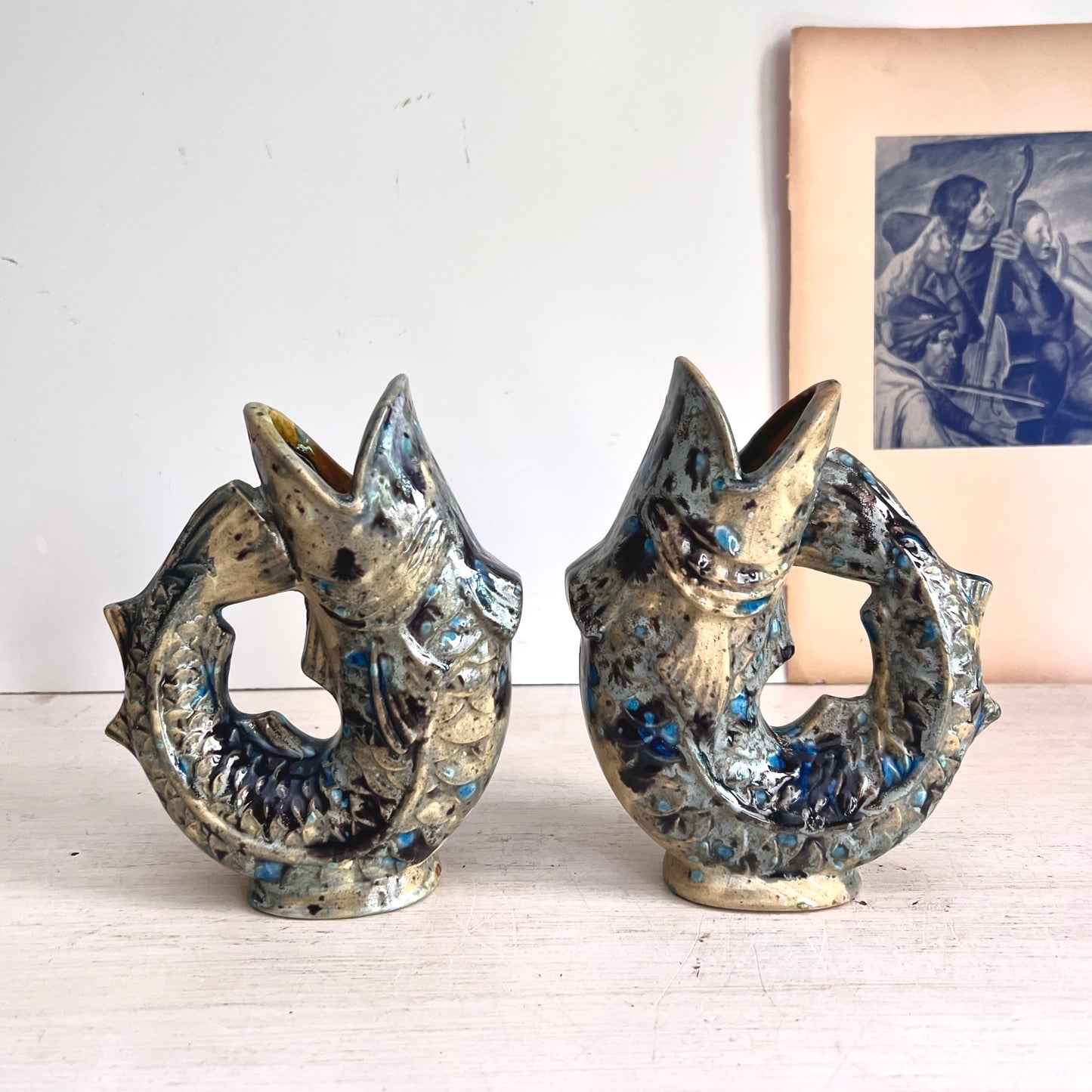 Pair of Speckled Pottery Jug Fishes