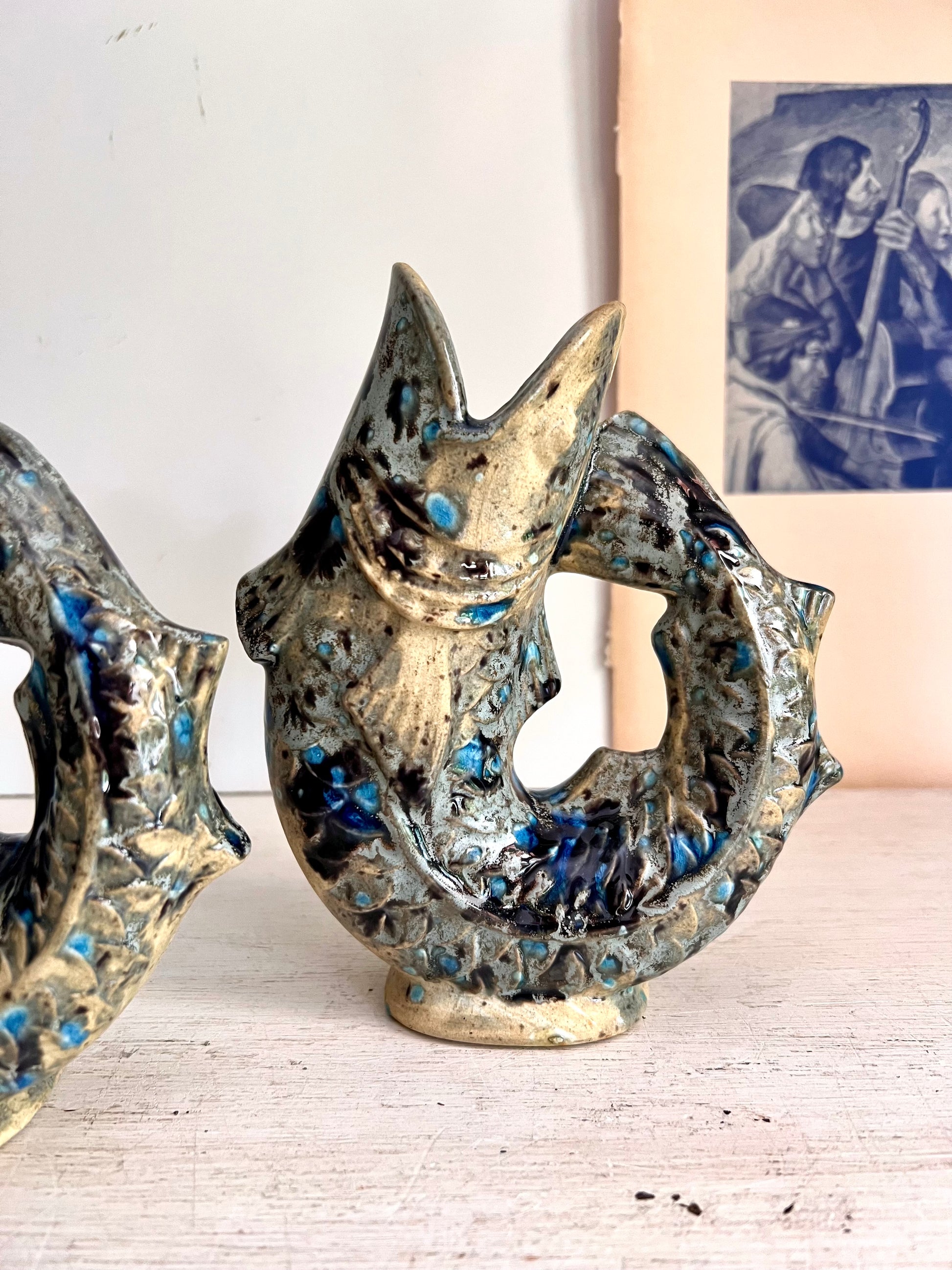 Pair of Speckled Pottery Jug Fishes