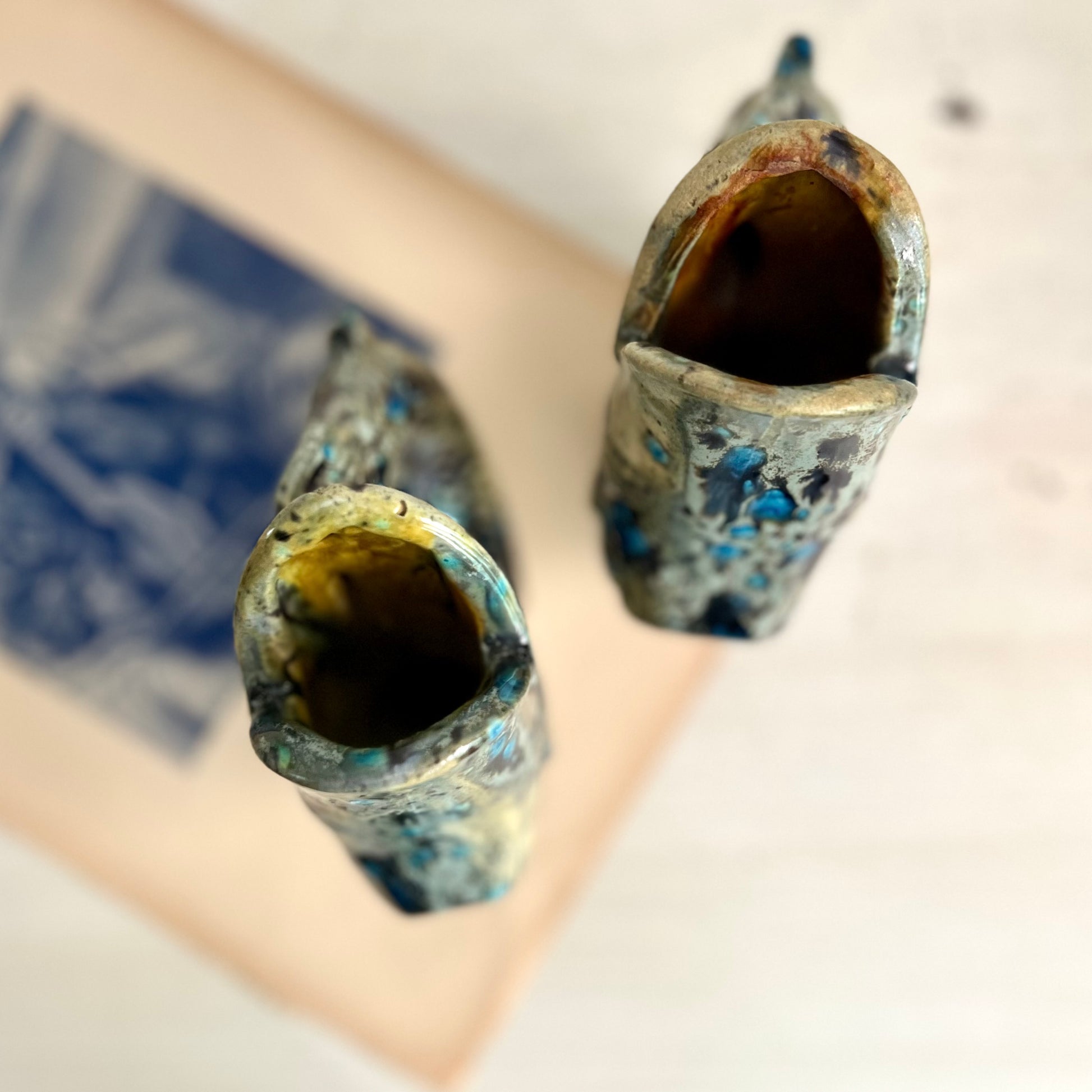 Pair of Speckled Pottery Jug Fishes