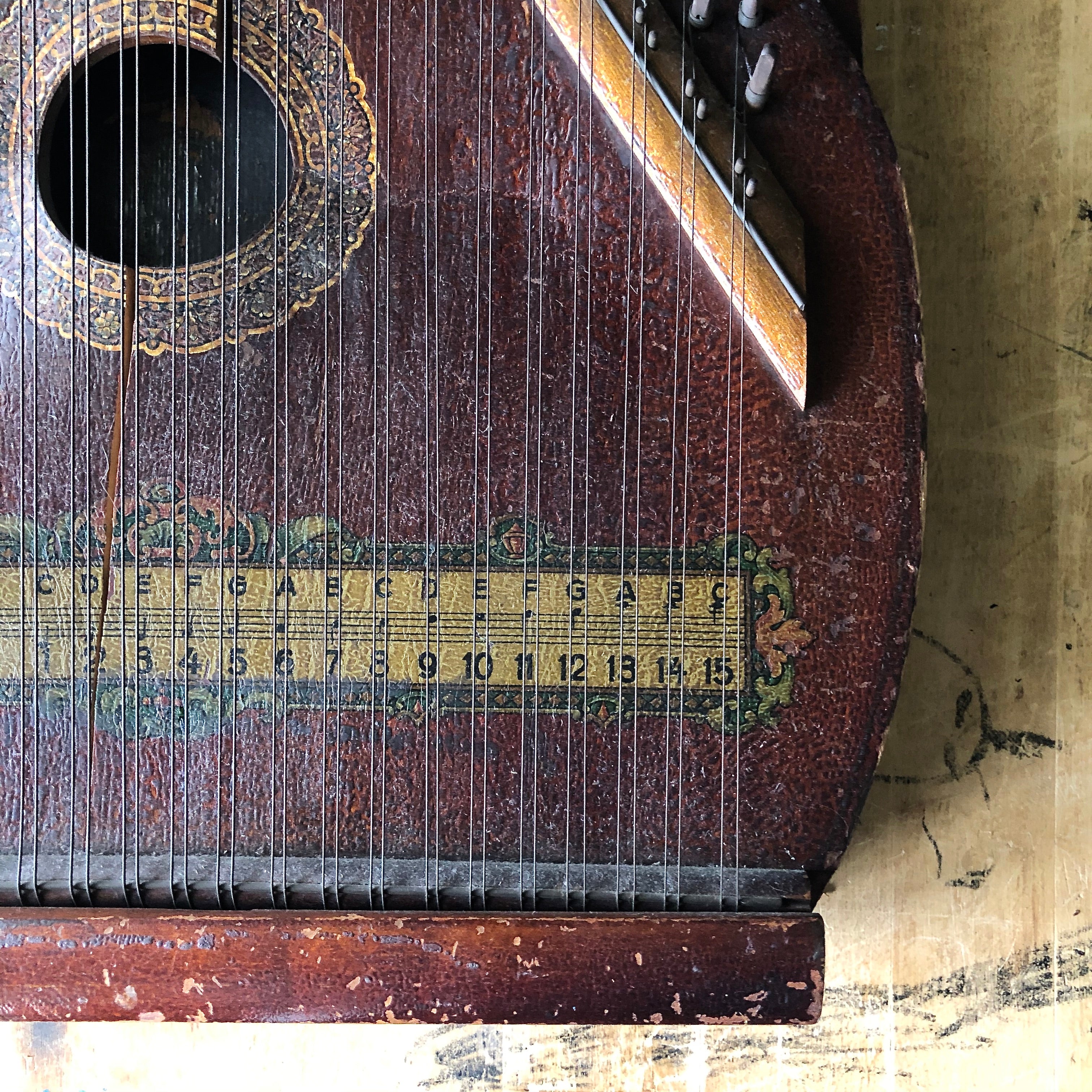 Old zither deals like stringed instrument