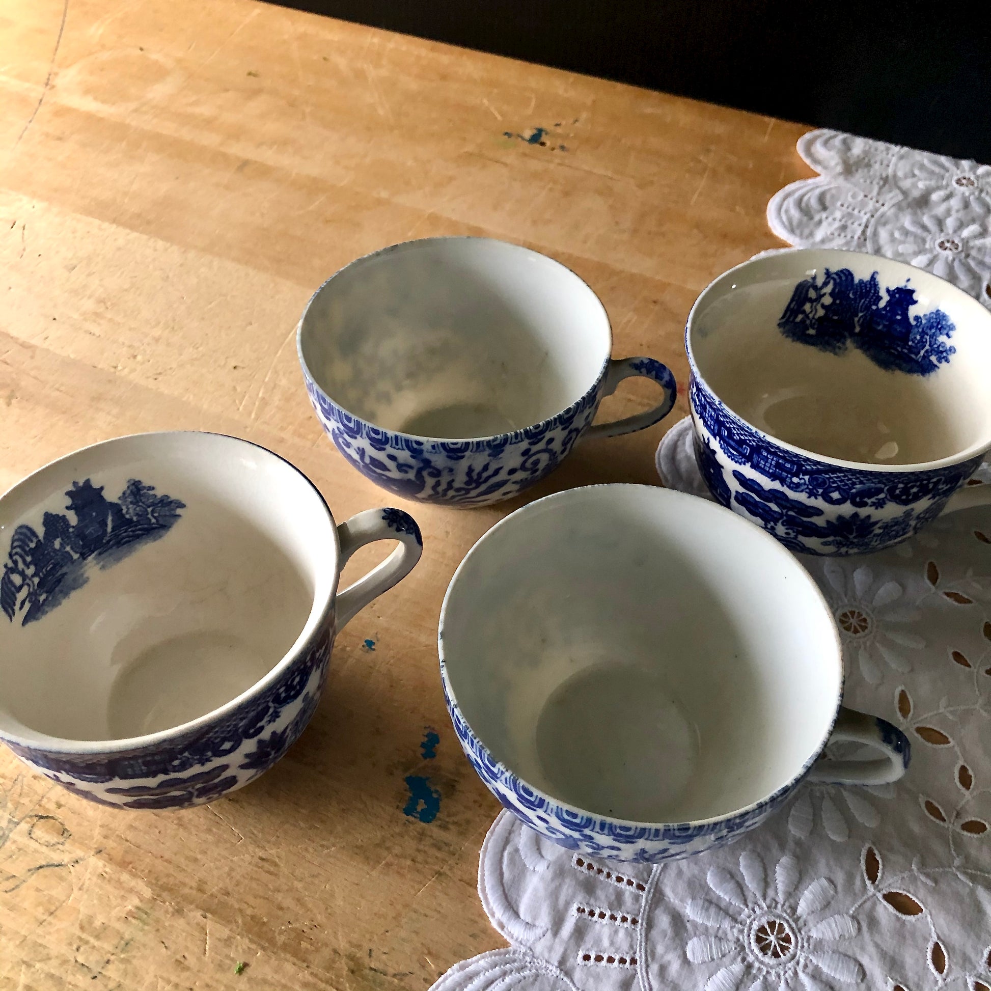 Mismatched Blue and White Tea Cups and Saucers