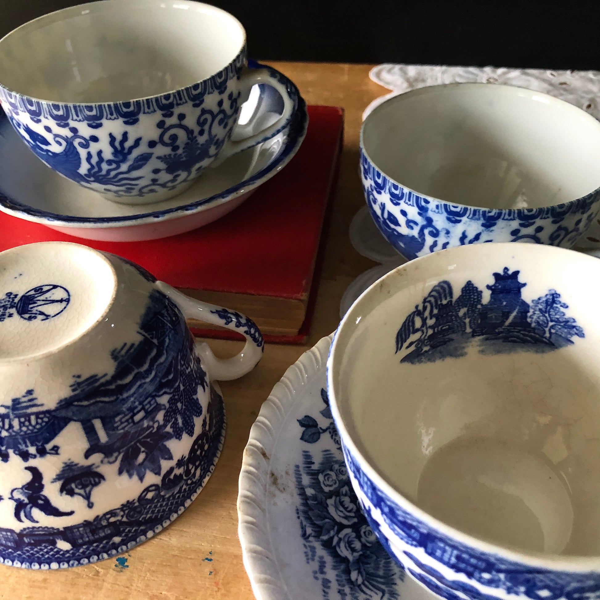 Mismatched Blue and White Tea Cups and Saucers