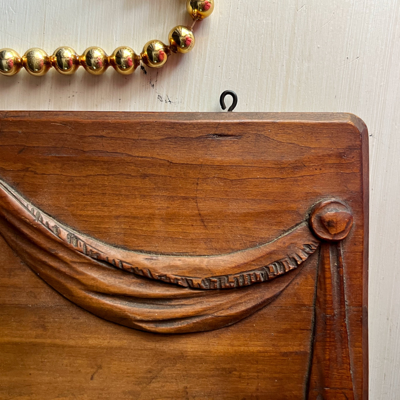 Antique Hanging Wooden Plaque with Carved Sash Decoration (c.1900s)