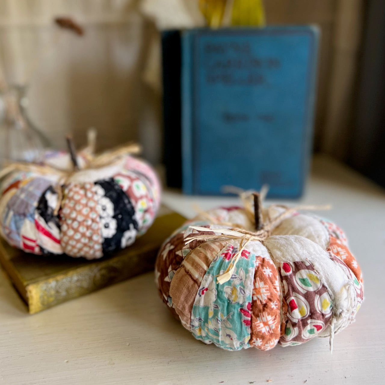 Two Handcrafted Pumpkins Made with Antique Quilts