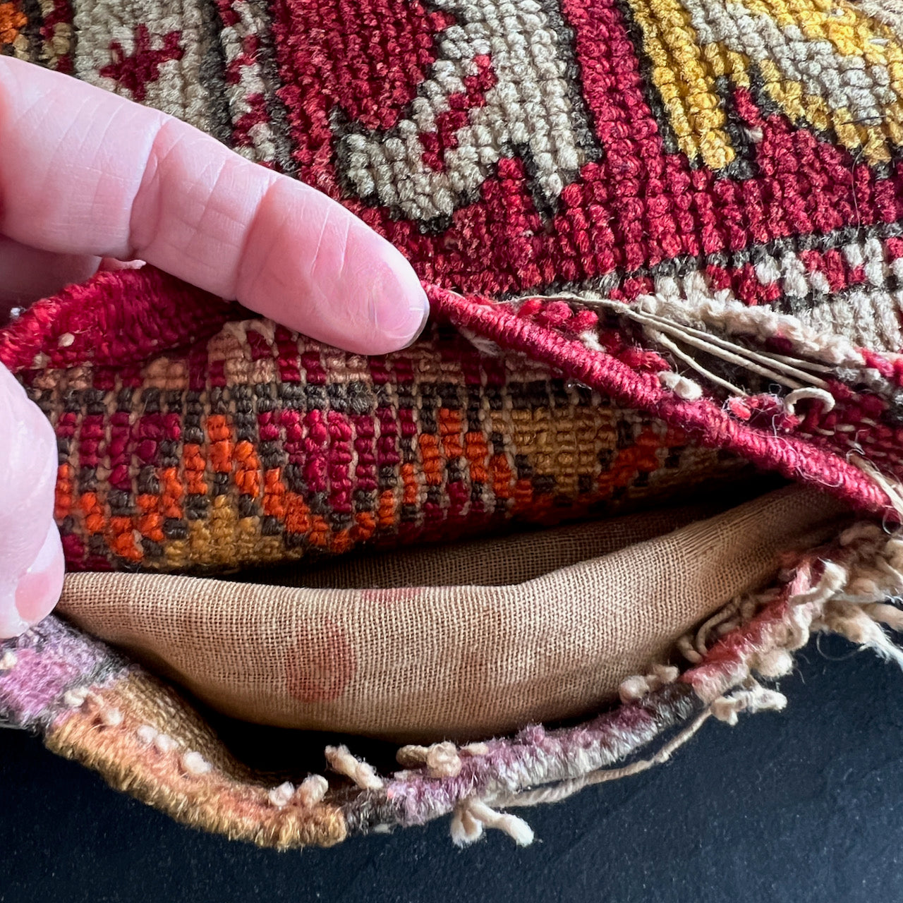 Old Hand Sewn Bag Face Seat Cushion with Repairs