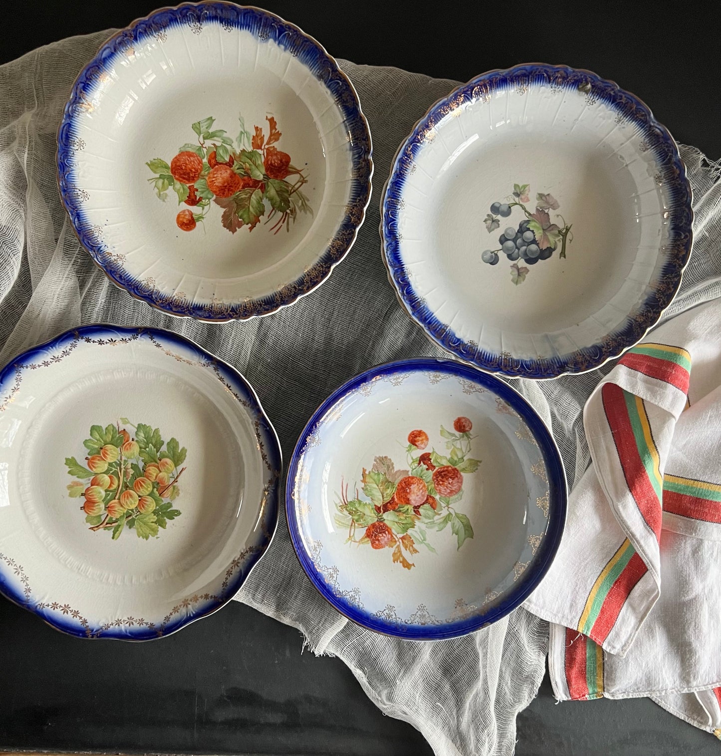 Mismatched Antique Flow Blue Bowls with Transferware Fruit, Set of 4 (c.1900s)